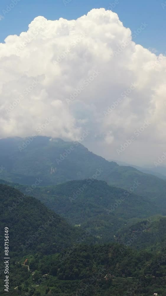 Mountains covered rainforest, trees and blue sky with clouds. Sri Lanka. Mountains covered rainforest, trees and blue sky with clouds. Sri Lanka.