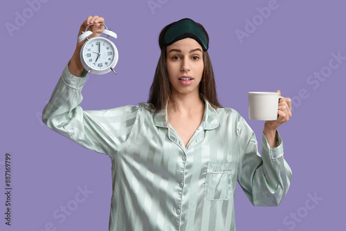 Young woman in pajamas and ...