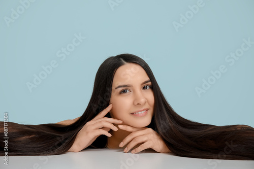 Beautiful young woman with ...