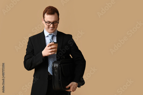 Young man with briefcase an...