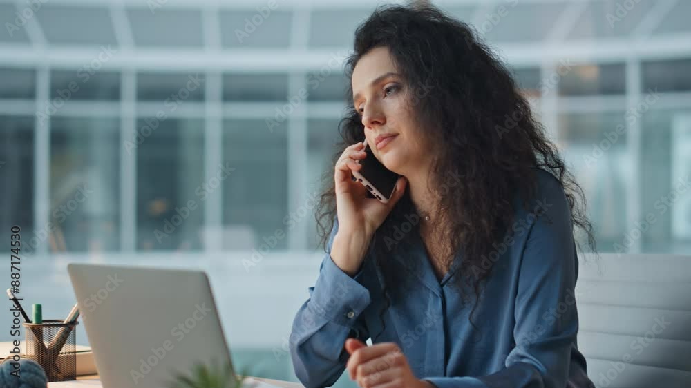 Manager discussing problem call in evening. Closeup serious professional working Manager discussing problem call in evening. Closeup serious professional working