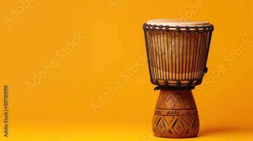 Djembe Drum on Yellow Background.