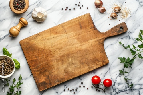 utting board over marble table background. Cooking backdrop. Top view with space for your recipe photo