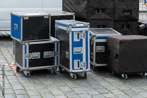 musical equipment for a show, wooden boxes with wheels for concert stage equipment before a concert. photo