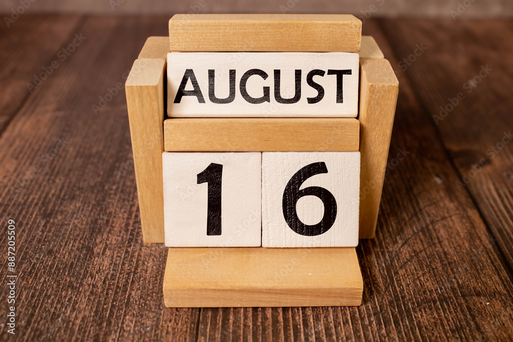 August 16th. Image of august 16 wooden color calendar on blue background. Summer day. August 16th. Image of august 16 wooden color calendar on blue background. Summer day.