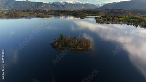 Aerial view, Staffelsee with islands, Garmisch Partenkirchen region, Bavaria, Germany near Murnau in sunny weather at sunset in spring. Drone view over islands of a large beautiful lake in Bayern.  photo