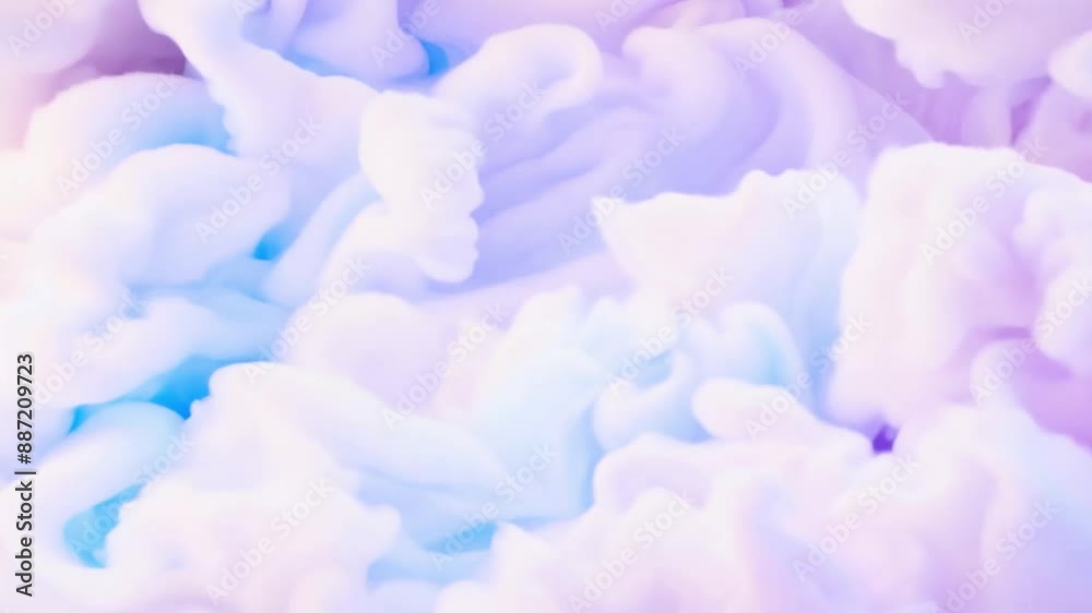 Abstract background of pastel blue and purple ink swirling in water. Abstract background of pastel blue and purple ink swirling in water.