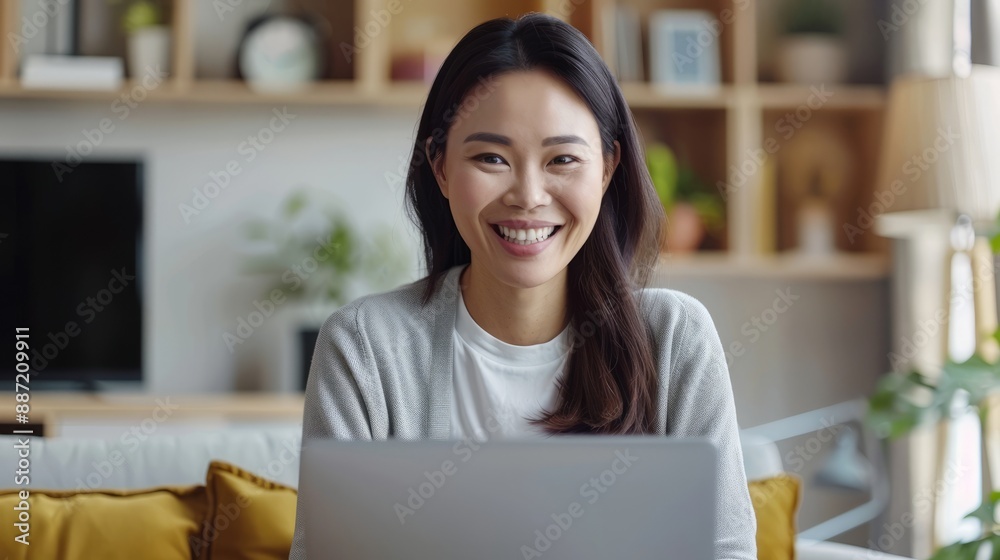 Happy young women working remotely from home with virtual video team meeting calls, remote working and flexible cultural ideas Happy young women working remotely from home with virtual video team meeting calls, remote working and flexible cultural ideas