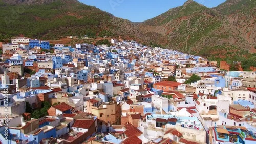 Explore Chefchaouen, the Blue City of Morocco, from above and take in its beauty among the Rif Mountains. The vibrant culture and azure buildings make it an enchanting destination