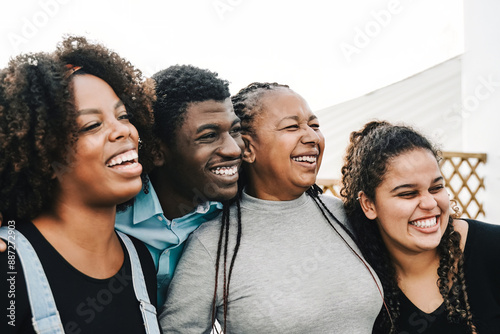 African family, Happy mother, son and daughters having fun together outside home backyard