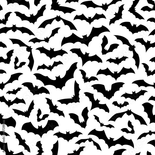 Halloween bats seamless pattern, a flurry of nocturnal creatures in flight, silhouetted against white background, creates a hauntingly stylish vector tile for spooky celebrations, wallpapers and decor