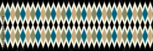 A ethnic ikot pattern of squares and diamonds in various colors. The pattern is very intricate and detailed. The colors are blue, green, and brown. The pattern is made up of squares and triangles desi photo