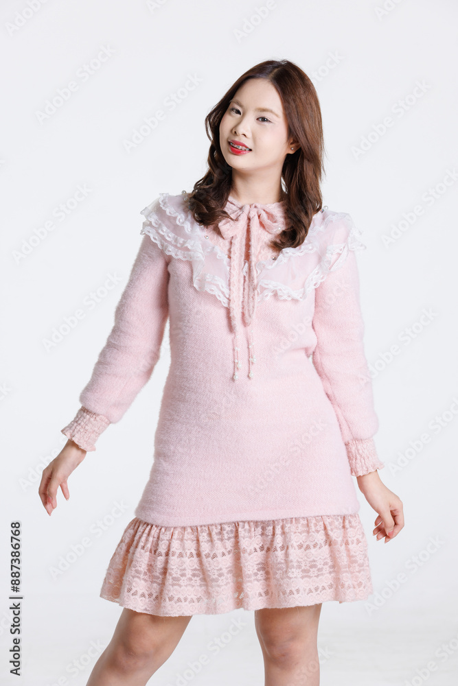 Portrait of Asian cute cheerful teen girl wearing light pink dress, stylish model woman with happy and cool sweet smile posing isolated on white background, Teenage and youth fashion Portrait of Asian cute cheerful teen girl wearing light pink dress, stylish model woman with happy and cool sweet smile posing isolated on white background, Teenage and youth fashion