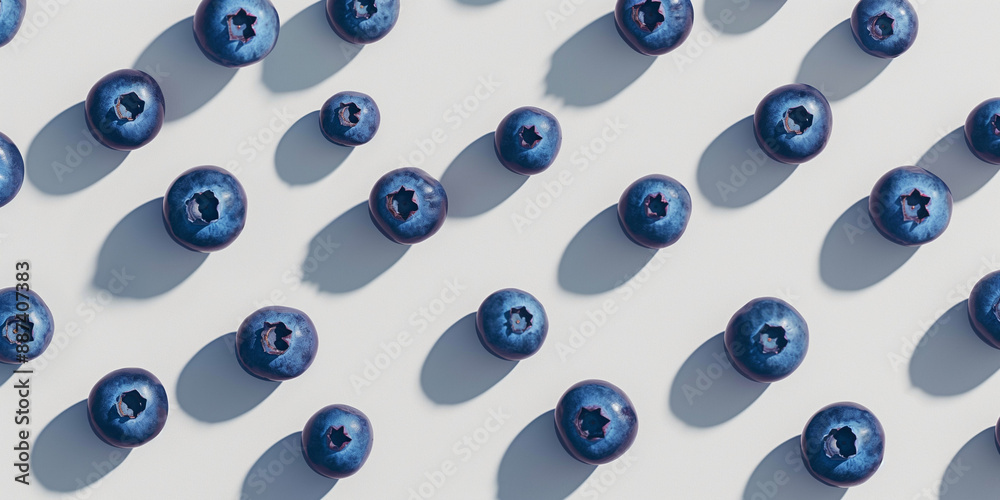 A background of blueberries, each with its shadow, scattered across the canvas in an elegant display, with soft shadows on a white background A background of blueberries, each with its shadow, scattered across the canvas in an elegant display, with soft shadows on a white background