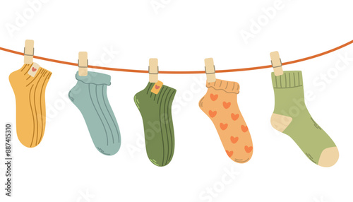 Socks on a rope, drying cotton socks on a rope, kids socks with textures and patterns, illustration of cotton products