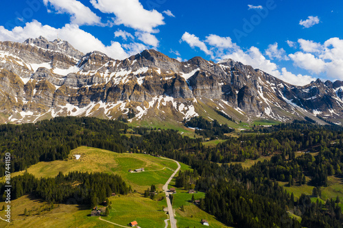 Appenzell, Switzerland: Aerial drone view of the stunning Santis mountain in the alps in Canton Appenzell in eastern Switzerland in spring. photo