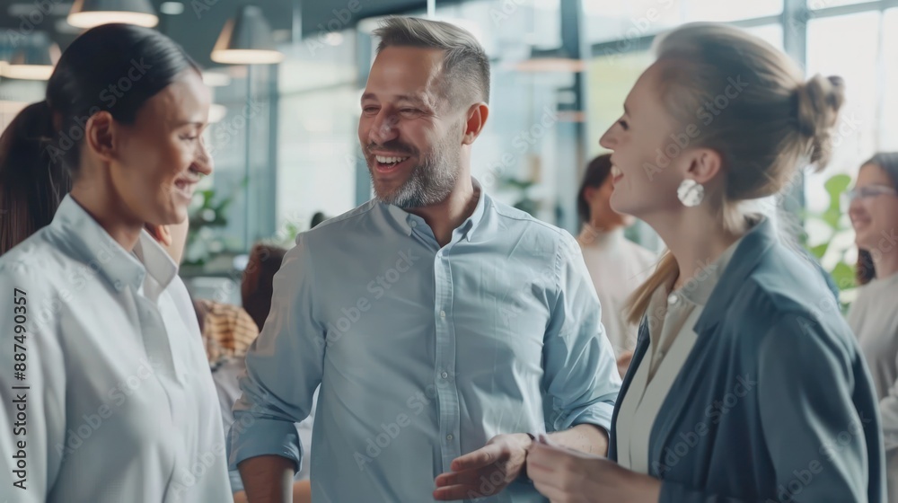 Happy multi-ethnic co-workers gathered together working discuss current issues common tasks caucasian team leader talks with colleague business workplace slow motion. 
