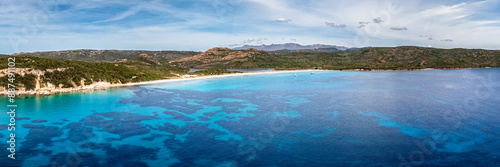 Panoramic aerial view of the Plage de Balistra and the translucent turquoise Mediterranean sea on the south east coast of the island of Corsica