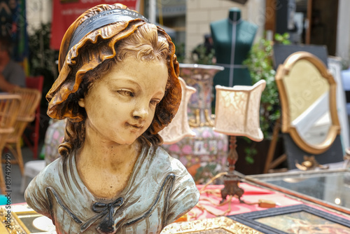 Figurine bust of a young woman on flea market Arezzo Italy photo