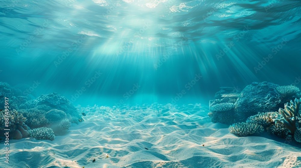 Fototapeta premium an underwater scene with sandy ocean floor, blue sea water, and coral reefs in the background