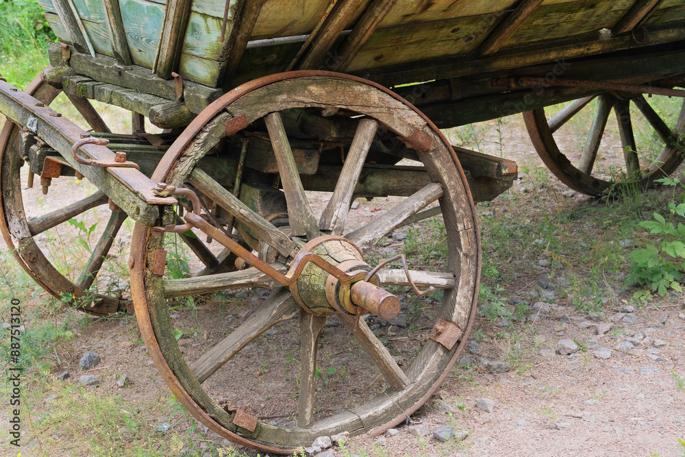 Retro wooden cart. Village vehicle in nature background. Retro wooden cart. Village vehicle in nature background.