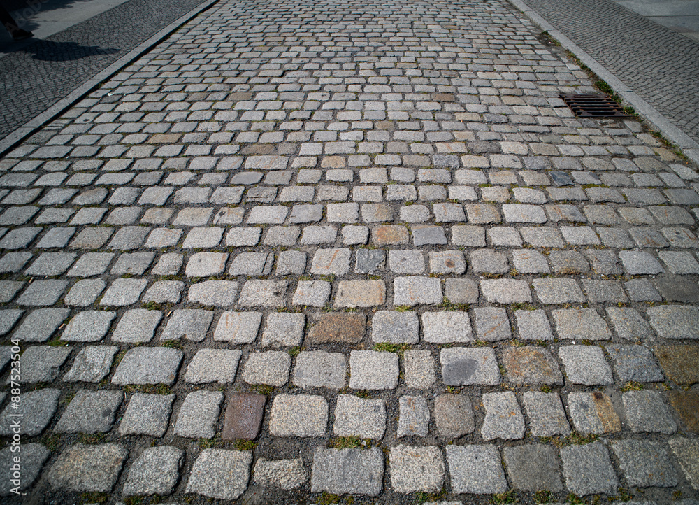 Cobblestone pavement background. Textured background of cobblestone road. Cobblestone pavement for background. Cobblestone road background. Sidewalk. Cobblestone pavement background. Textured background of cobblestone road. Cobblestone pavement for background. Cobblestone road background. Sidewalk.