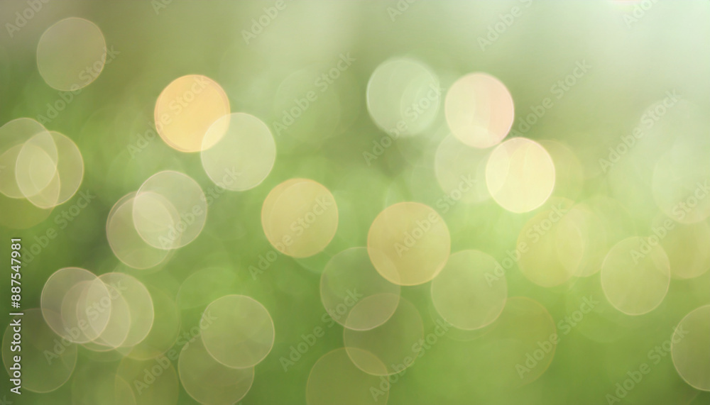Fototapeta premium Abstract background of blurry circles of light, creating a soft and dreamy effect. The colors are mainly green and white, with a touch of golden.
