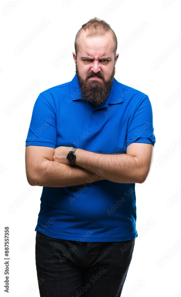 Obraz premium Young caucasian hipster man wearing blue shirt over isolated background skeptic and nervous, disapproving expression on face with crossed arms. Negative person.