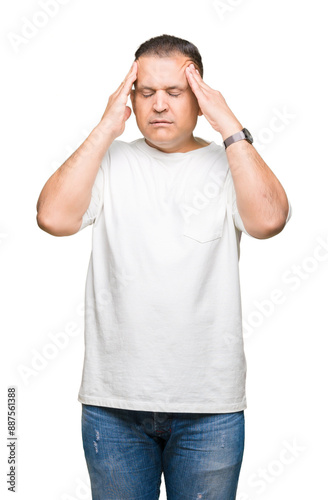 Middle age arab man wearig white t-shirt over isolated background with hand on head for pain in head because stress. Suffering migraine.