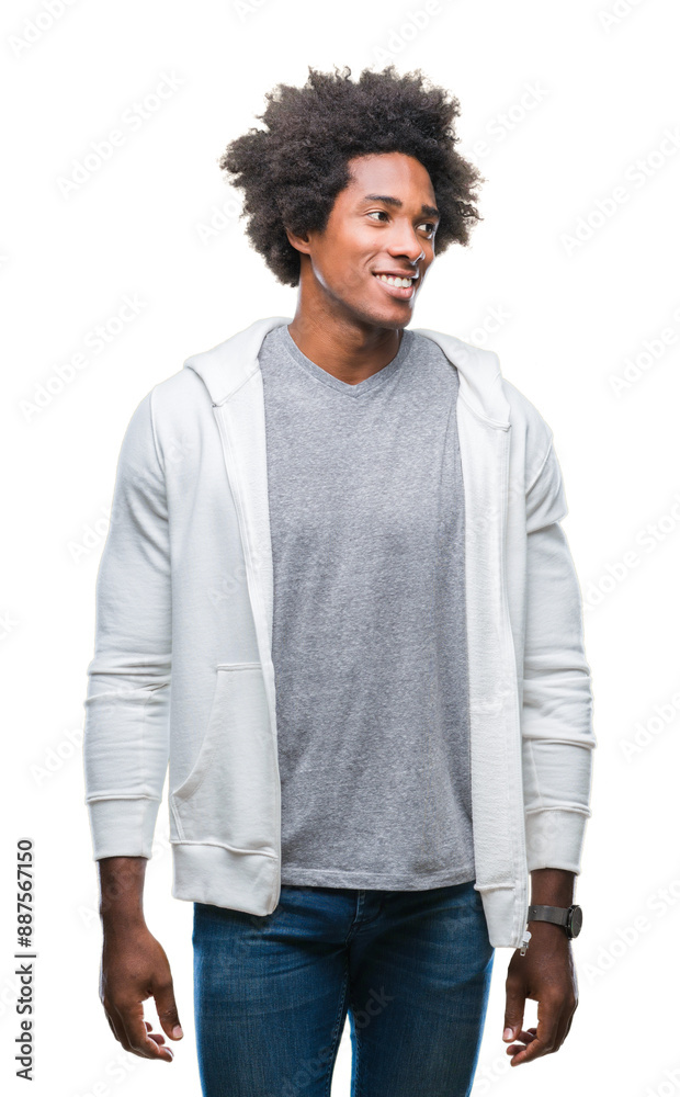 Afro american man wearing sweatshirt over isolated background looking away to side with smile on face, natural expression. Laughing confident. Afro american man wearing sweatshirt over isolated background looking away to side with smile on face, natural expression. Laughing confident.