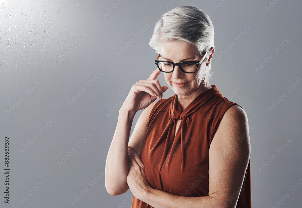 Thinking, idea and business woman in studio for problem solving, company insight and solution. Professional, corporate ceo and mature person for planning, brainstorming and choice on gray background Thinking, idea and business woman in studio for problem solving, company insight and solution. Professional, corporate ceo and mature person for planning, brainstorming and choice on gray background