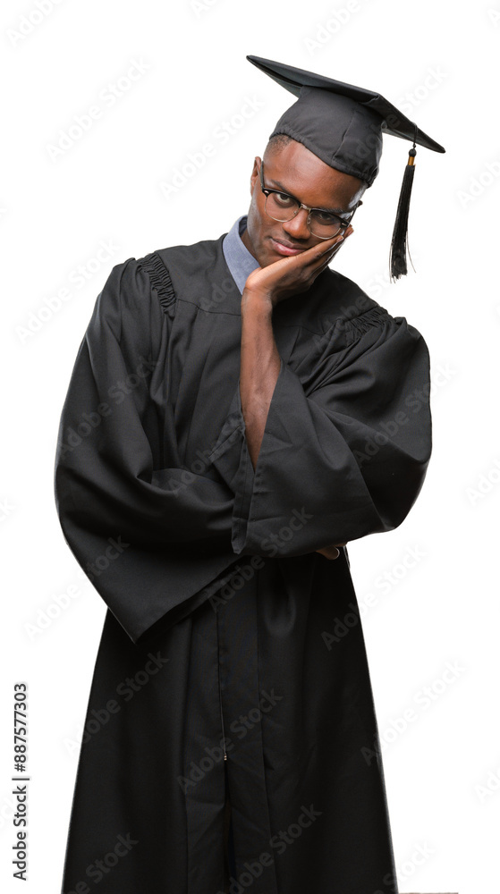 Young graduated african american man over isolated background thinking looking tired and bored with depression problems with crossed arms. Young graduated african american man over isolated background thinking looking tired and bored with depression problems with crossed arms.