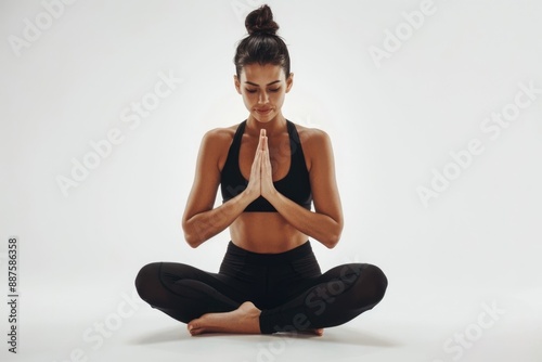 Young woman practicing yoga for healthy mind body balance. © darshika