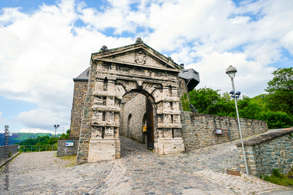 View of the entrance gate to Altena Castle. Old castle on the Klusenberg of the city.
View of the entrance gate to Altena Castle. Old castle on the Klusenberg of the city.