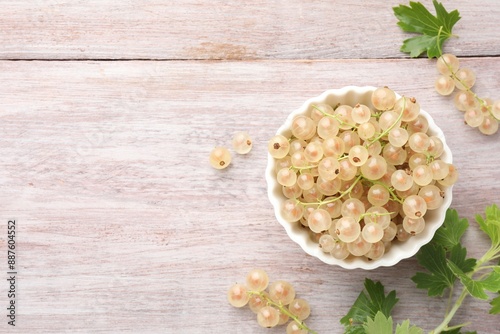 Wallpaper Mural Fresh white currant berries in bowl and green leaves on wooden table, flat lay. Space for text Torontodigital.ca