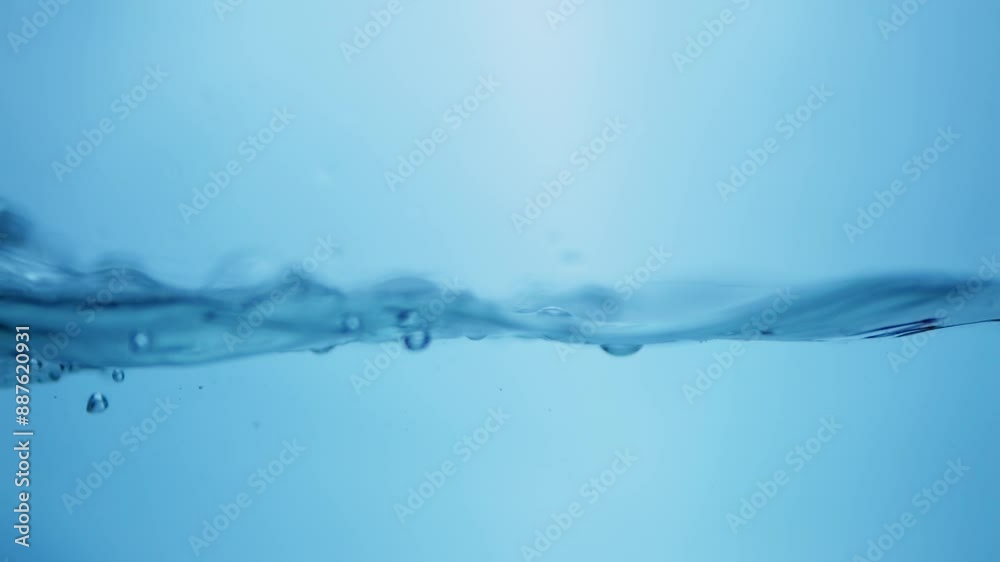 Magnificent water movement in super slow motion in a horizontal line