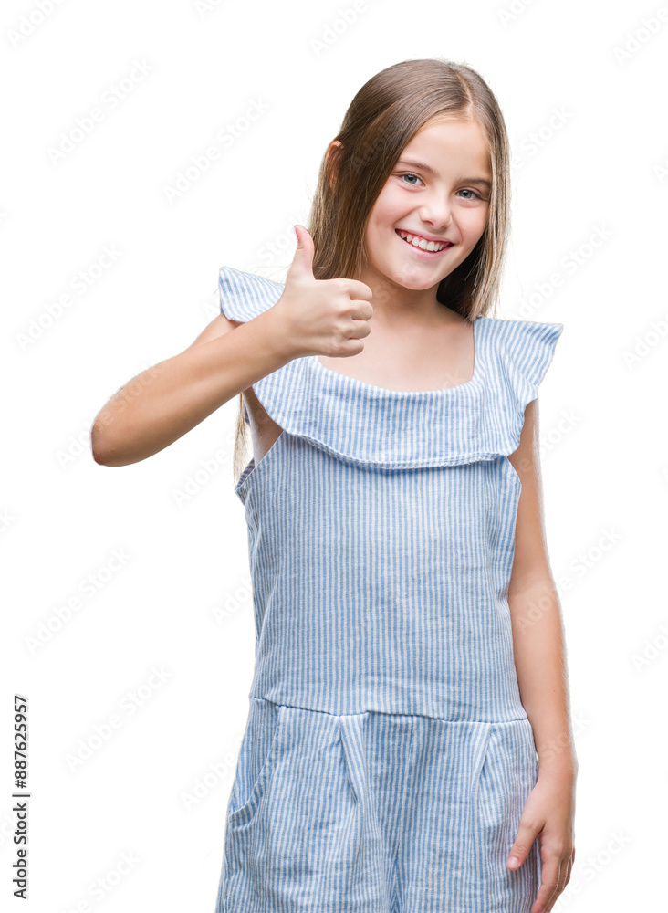 Young beautiful girl over isolated background doing happy thumbs up gesture with hand. Approving expression looking at the camera with showing success. Young beautiful girl over isolated background doing happy thumbs up gesture with hand. Approving expression looking at the camera with showing success.