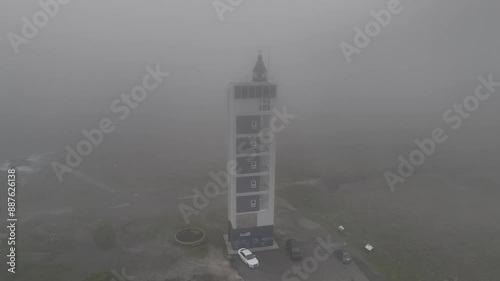 Faro Punta de Frouxeira de Valdoviño en un dia muy nublado photo