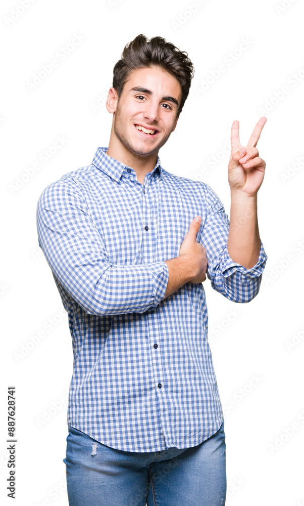 Young handsome business man over isolated background smiling with happy face winking at the camera doing victory sign. Number two.