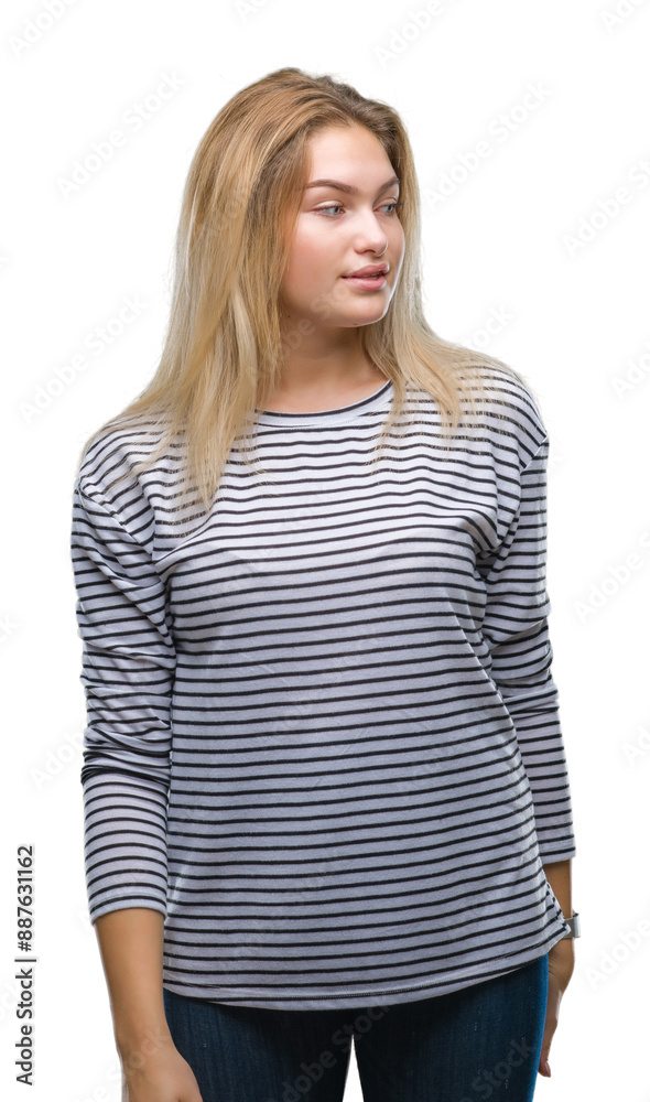 Young caucasian woman over isolated background looking away to side with smile on face, natural expression. Laughing confident. Young caucasian woman over isolated background looking away to side with smile on face, natural expression. Laughing confident.