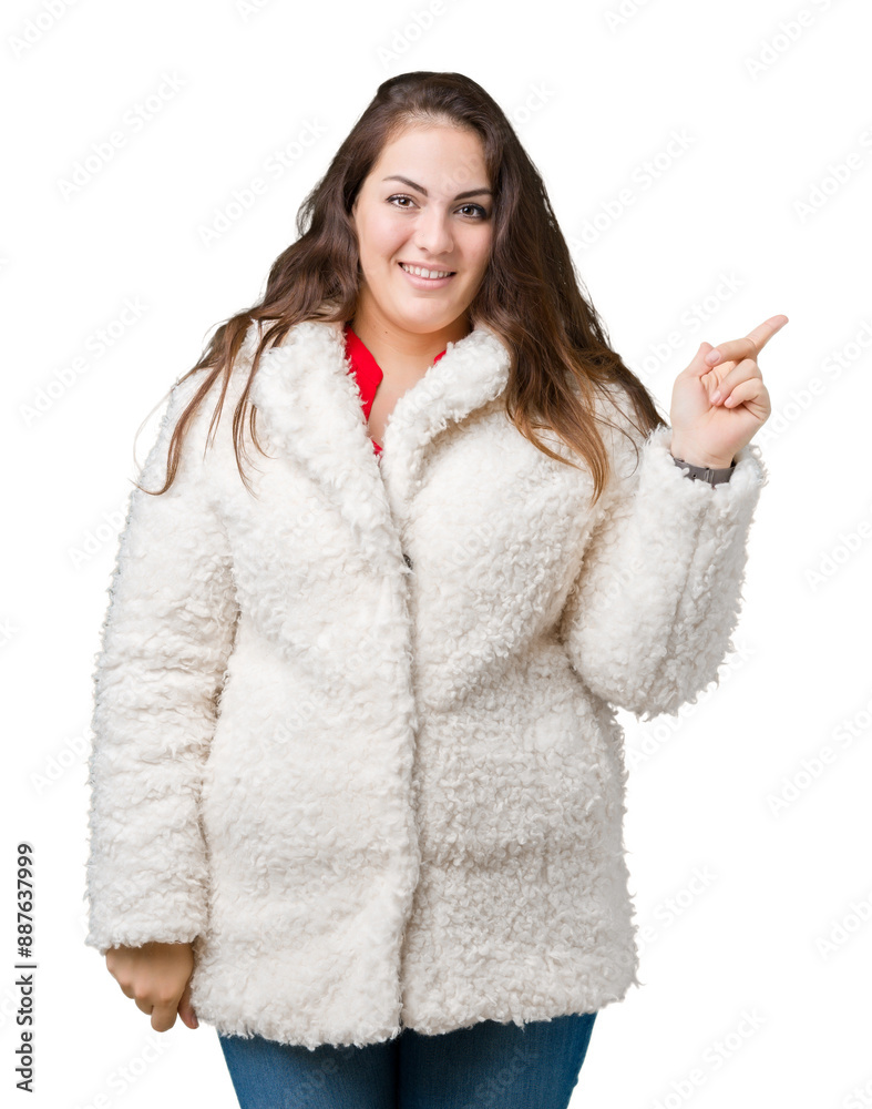 Beautiful plus size young woman wearing winter sheep coat over isolated background with a big smile on face, pointing with hand and finger to the side looking at the camera. Beautiful plus size young woman wearing winter sheep coat over isolated background with a big smile on face, pointing with hand and finger to the side looking at the camera.