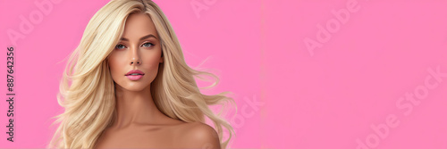 Flawless blonde with an elegant hairstyle of long hair on a pink background with copy space. © Dmitrii