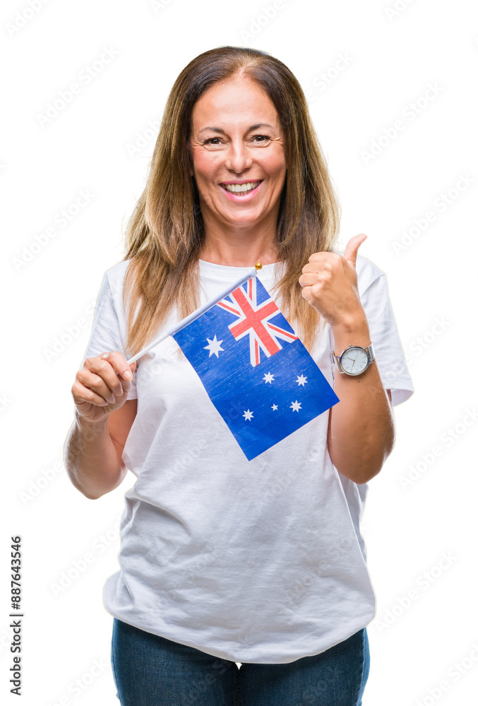 Middle age hispanic woman holding flag of Australia over isolated background happy with big smile doing ok sign, thumb up with fingers, excellent sign Middle age hispanic woman holding flag of Australia over isolated background happy with big smile doing ok sign, thumb up with fingers, excellent sign