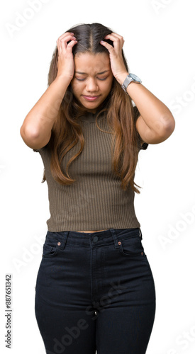 Young beautiful brunette woman over isolated background suffering from headache desperate and stressed because pain and migraine. Hands on head.