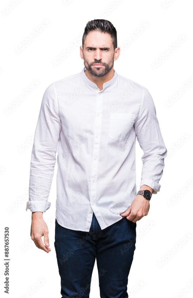 Young business man over isolated background skeptic and nervous, frowning upset because of problem. Negative person. Young business man over isolated background skeptic and nervous, frowning upset because of problem. Negative person.