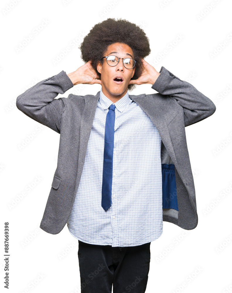 Young african american business man with afro hair wearing glasses Crazy and scared with hands on head, afraid and surprised of shock with open mouth Young african american business man with afro hair wearing glasses Crazy and scared with hands on head, afraid and surprised of shock with open mouth