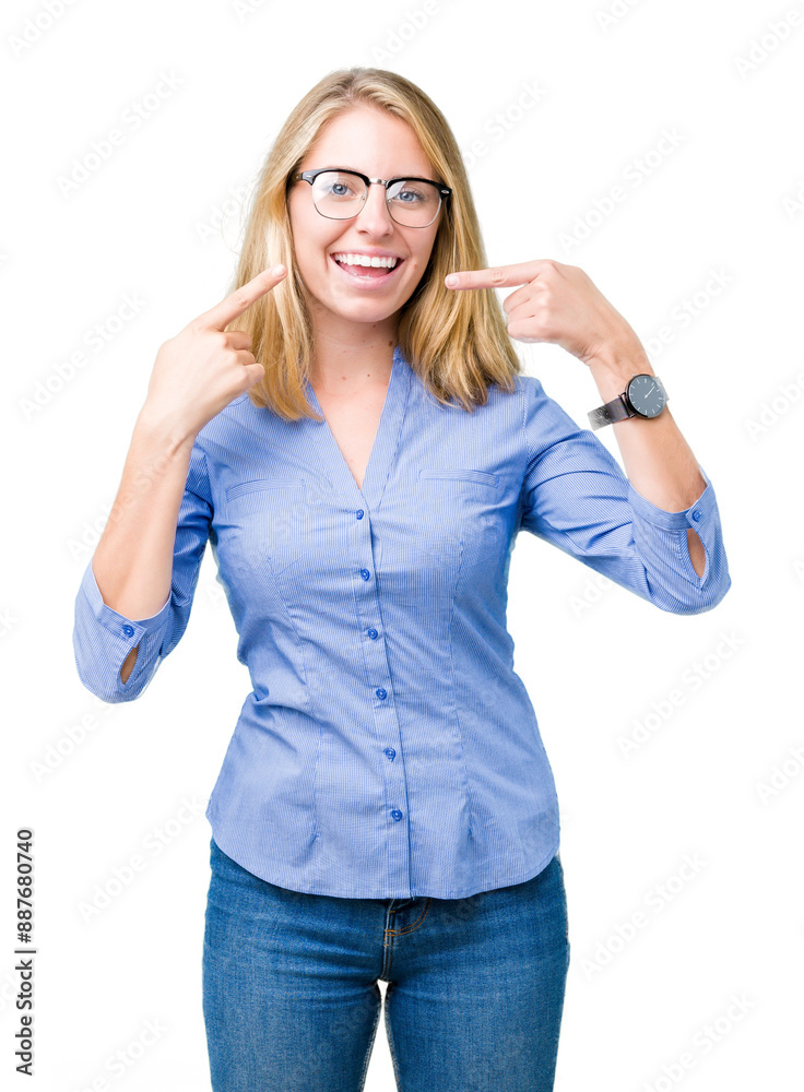 Beautiful young business woman over isolated background smiling confident showing and pointing with fingers teeth and mouth. Health concept.