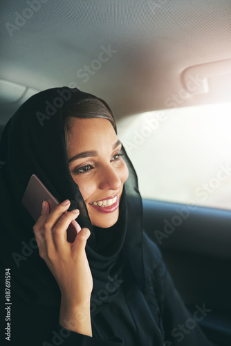 Muslim woman, smile and phone call in car for travel, journey or commute to work in transport. Islam, taxi or passenger talk on mobile for business deal or sales consultant listening to news in Dubai