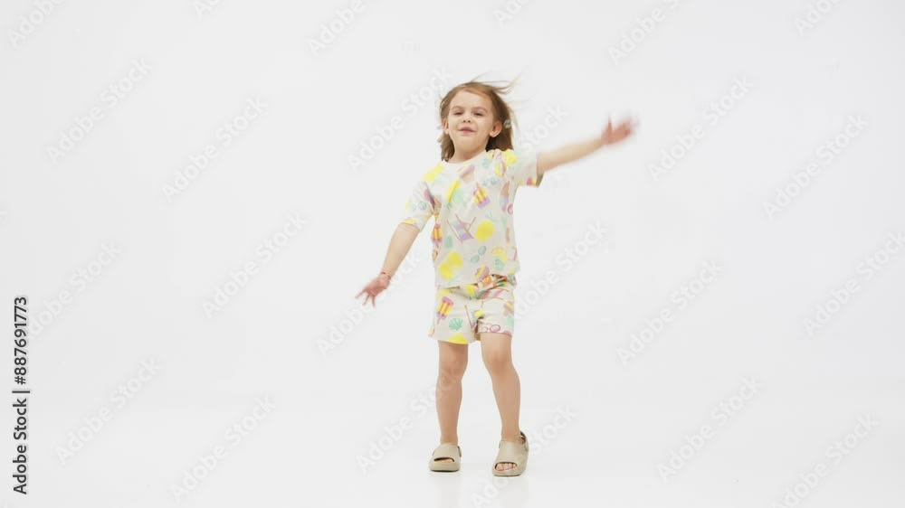 Happy smiling child having fun on white studio background. The concept of childhood and childish emotions. Happy smiling child having fun on white studio background. The concept of childhood and childish emotions.