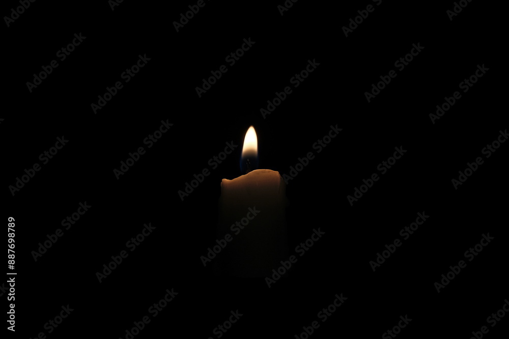 candle light on a black background, close-up of photo candle light on a black background, close-up of photo